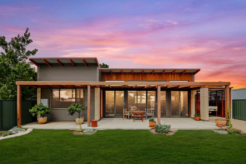 Rammed Earth and Heavy Timber Home